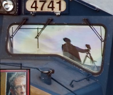 Composite photo of JW Coniglio in, and on, cabs of both steam and diesel locomotives.